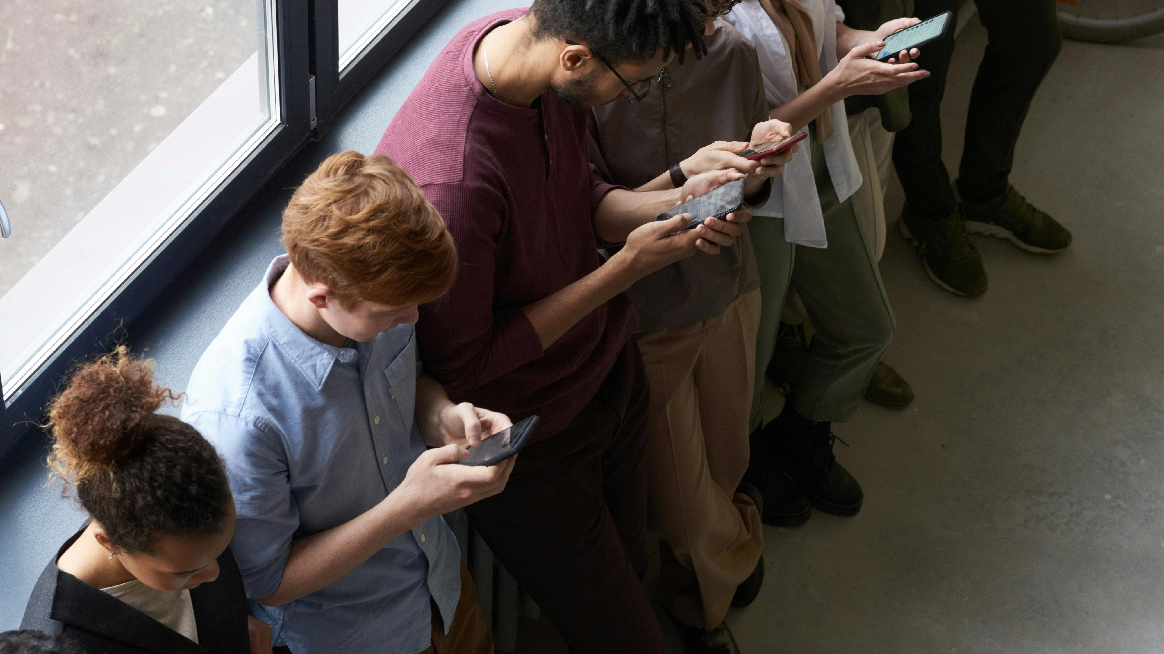 people using smartphones