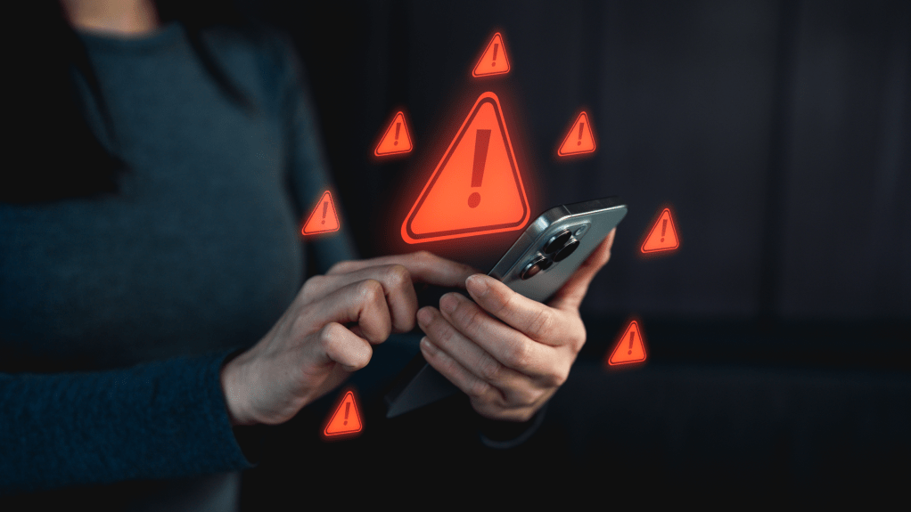 Smartphone mit Warnung