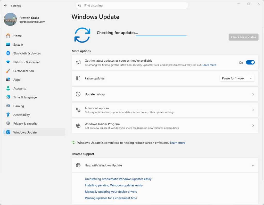 windows update screen in windows 11 showing checking for updates progress bar