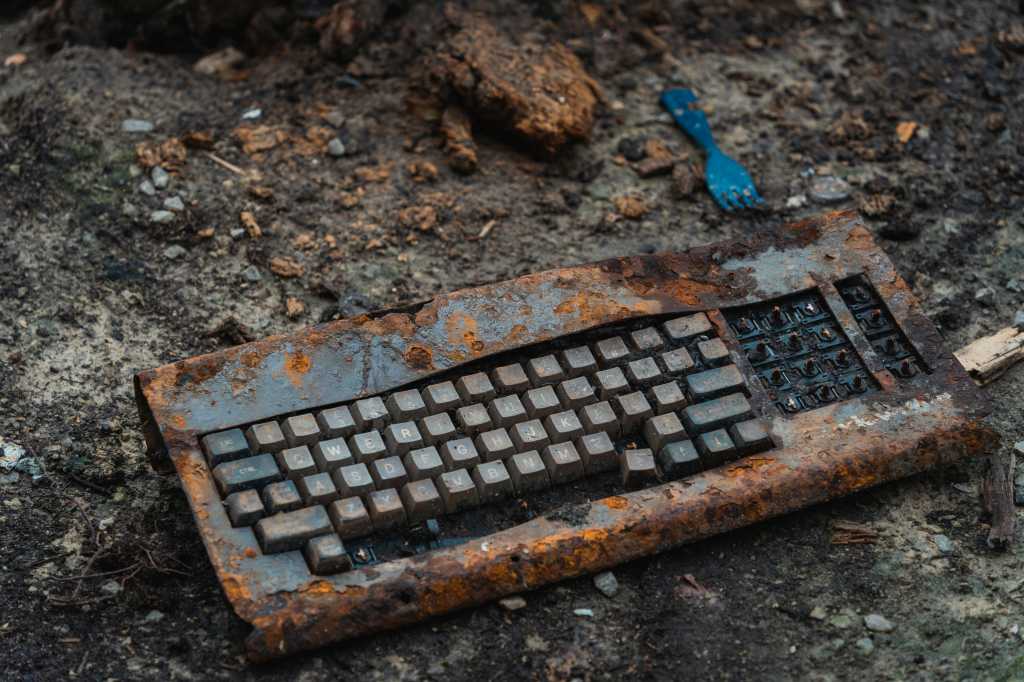 Rusty keyboard on the ground