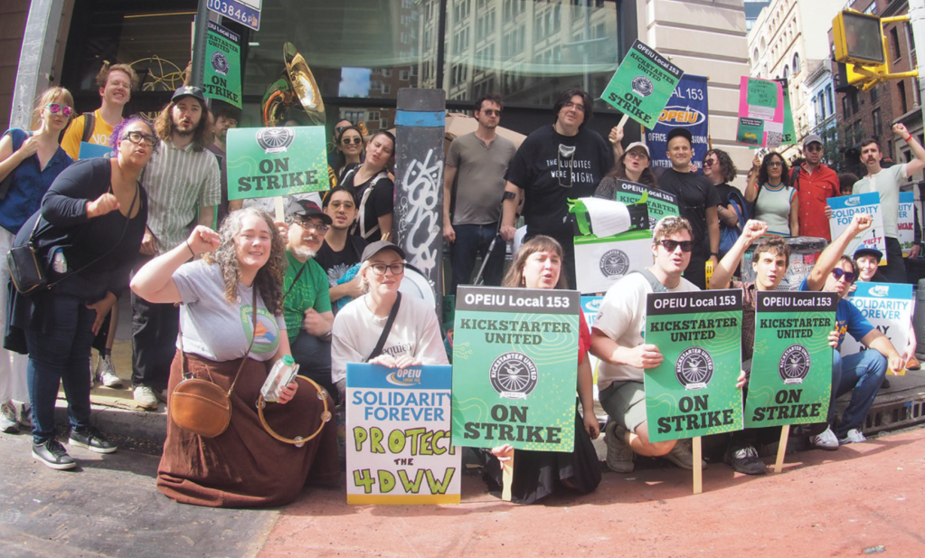 workers outside holding kickstarter united on strike signs